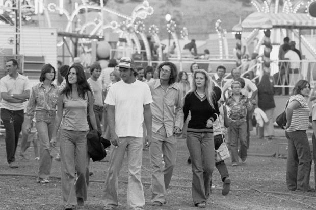 Fairgoers on the midway, 1976